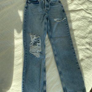 High-waisted ripped jeans